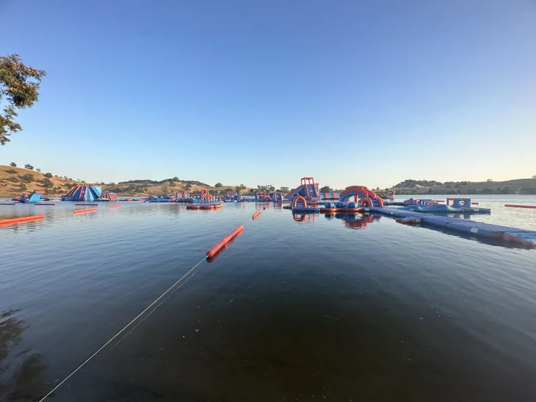 Photo of the Splash-n-Dash inflatable water park on the lake - America's largest inflatable water park - Lake McSwain, Snelling California